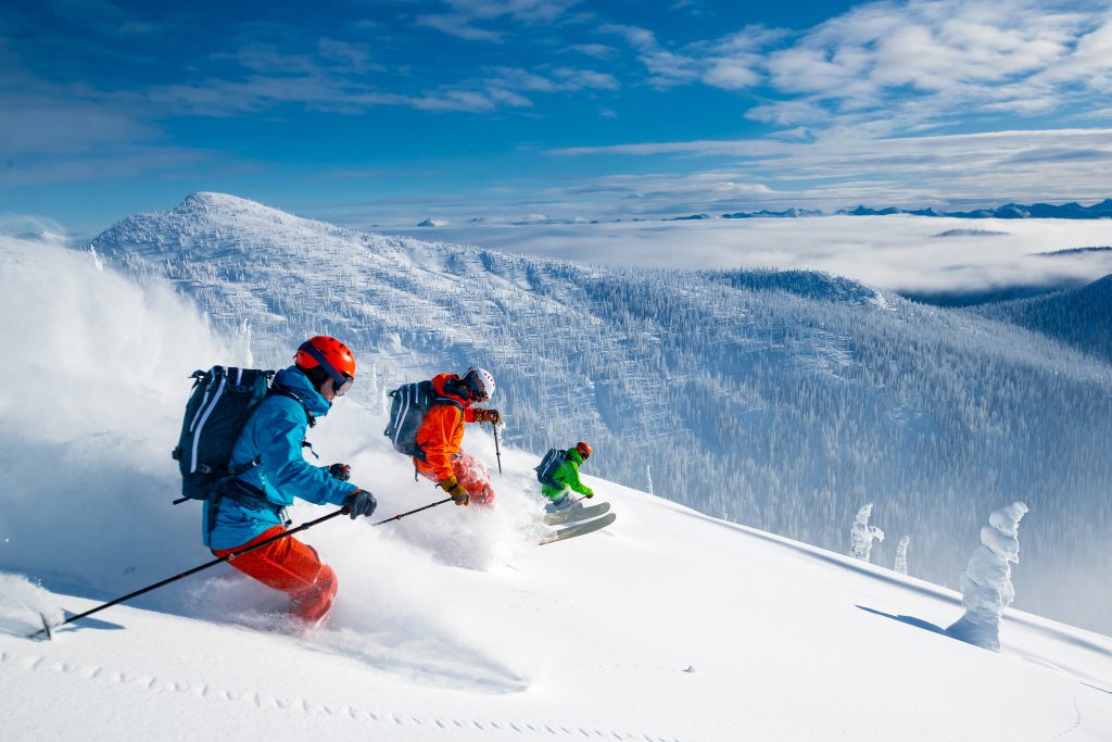 group skiing in Canadian mountains