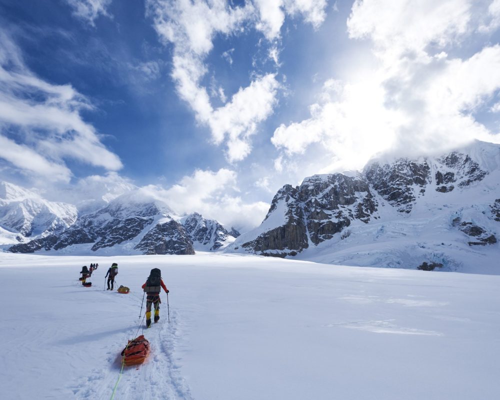 Mountaineers climbing Denali pulling a sled - Viking Travel