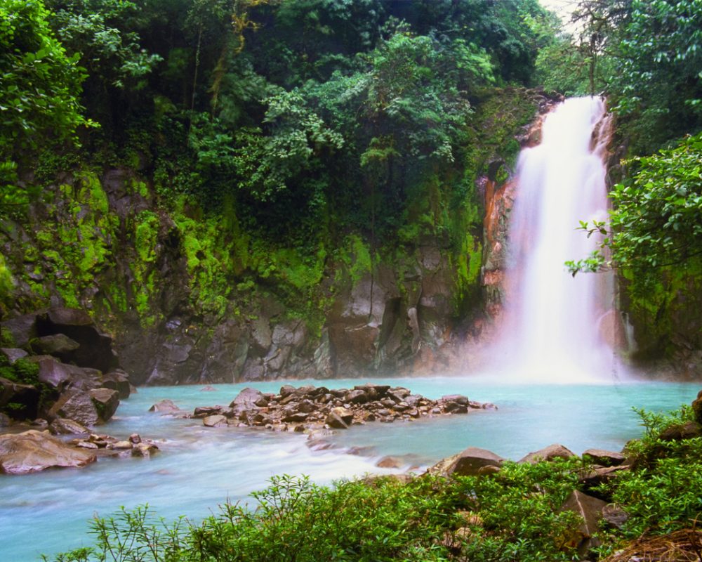 Waterfall in tropical rainforest - Viking Travel