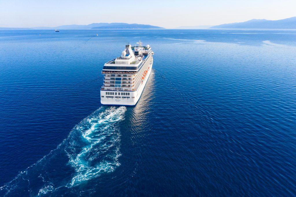 Cruise ship sailing on the ocean for world cruise - Viking Travel