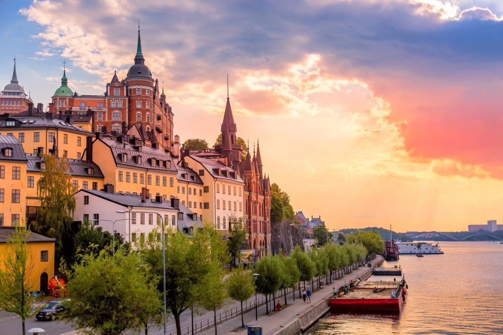 Stockholm, Sweden. Scenic summer sunset view with colorful sky of the Old Town architecture in Sodermalm district - Viking Travel