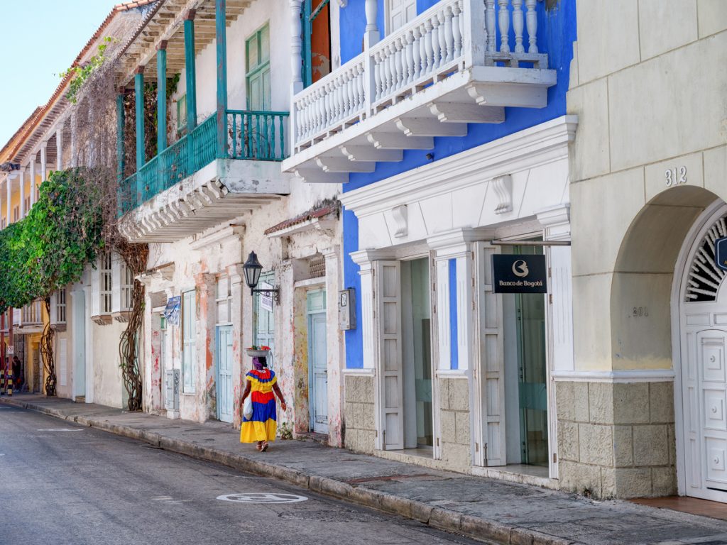 Lady walks along the road in Santa Marta, Colombia - Viking Travel