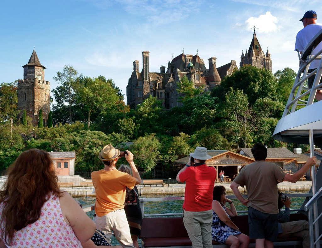 Boldt Castle and tourists on river cruise - Viking Travel